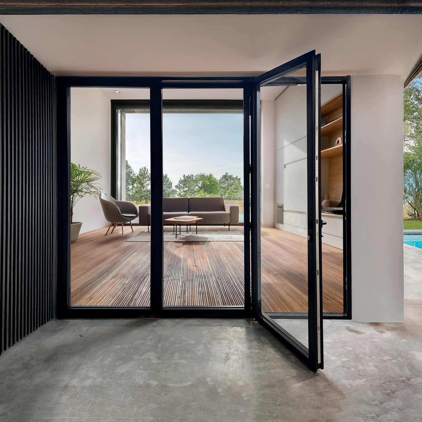 ENNION aluminum bi-fold door opening onto a pool patio